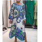 Elegant long dress with round neck and floral print
