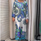 Elegant long dress with round neck and floral print